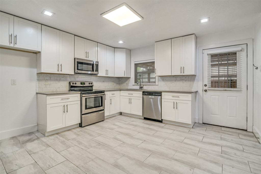 310 Thistle Drive, Garland, TX 75043 — photo 1