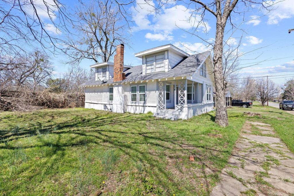 709 N Chandler Avenue, Denison, TX 75020 — photo 1
